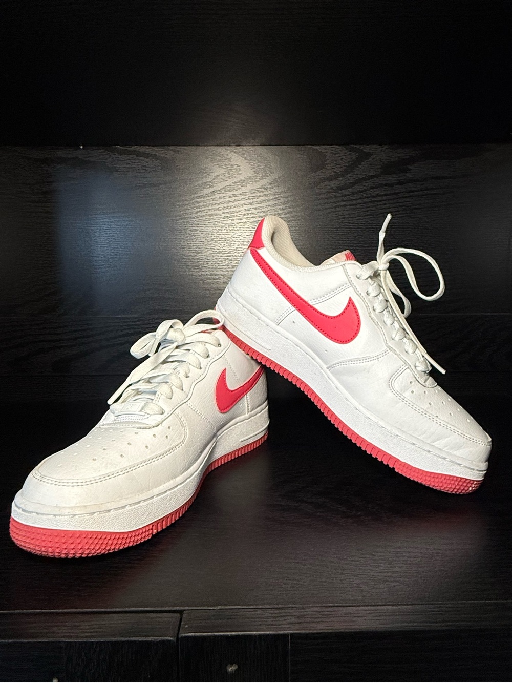 Nike Women’s Low-Top Sneakers in White with Pink Swoosh